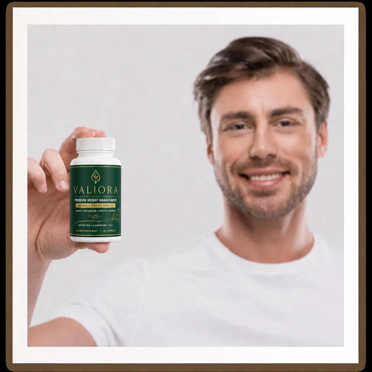 Valiora customer holding the supplement bottle in a home kitchen setting